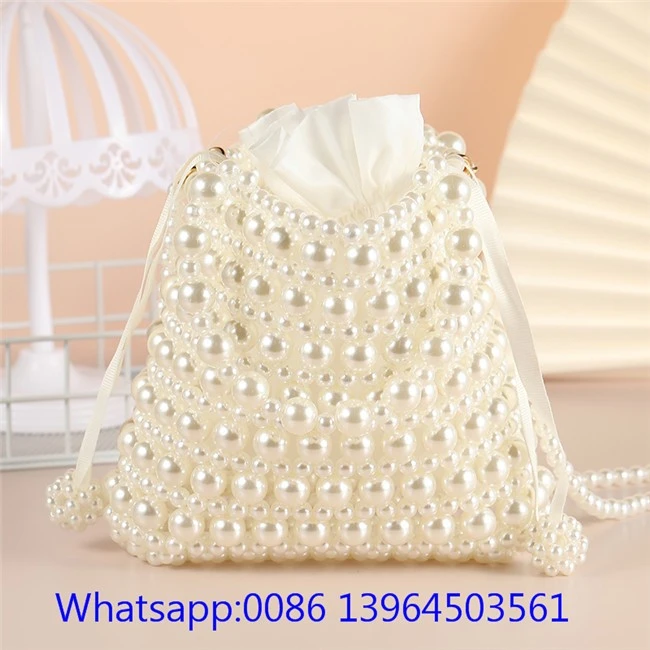 Bossa de mà de perles artificials per a dona